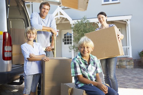 Professional movers handling furniture during a local move in Collierswood